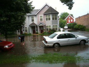 A man checking out his car in the flood