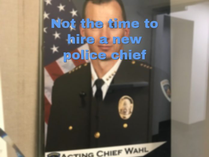 wait on police chief hire